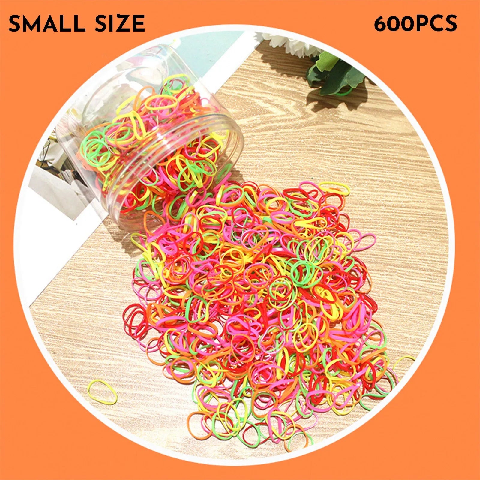 Multi-colour TPU baby hair ties in a reusable plastic storage container.
