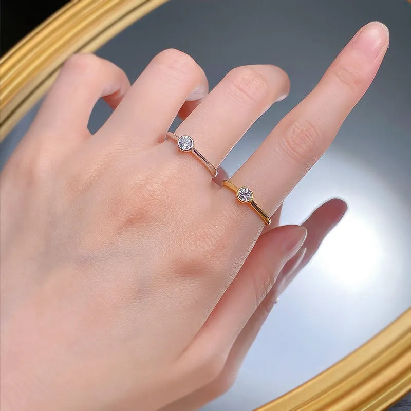 Minimalist silver crown ring with linear details in electroplated gold or platinum colour.