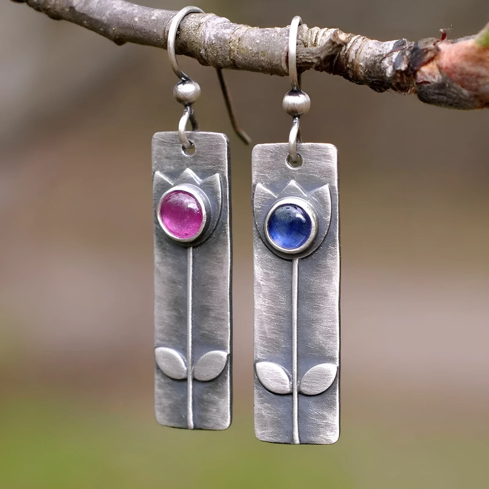 Antique finish red sapphire electroplated metal earrings with geometric ellipse design