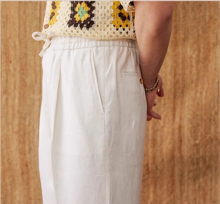 Linen loose high waist trousers with elasticated waistband in straight-leg cut