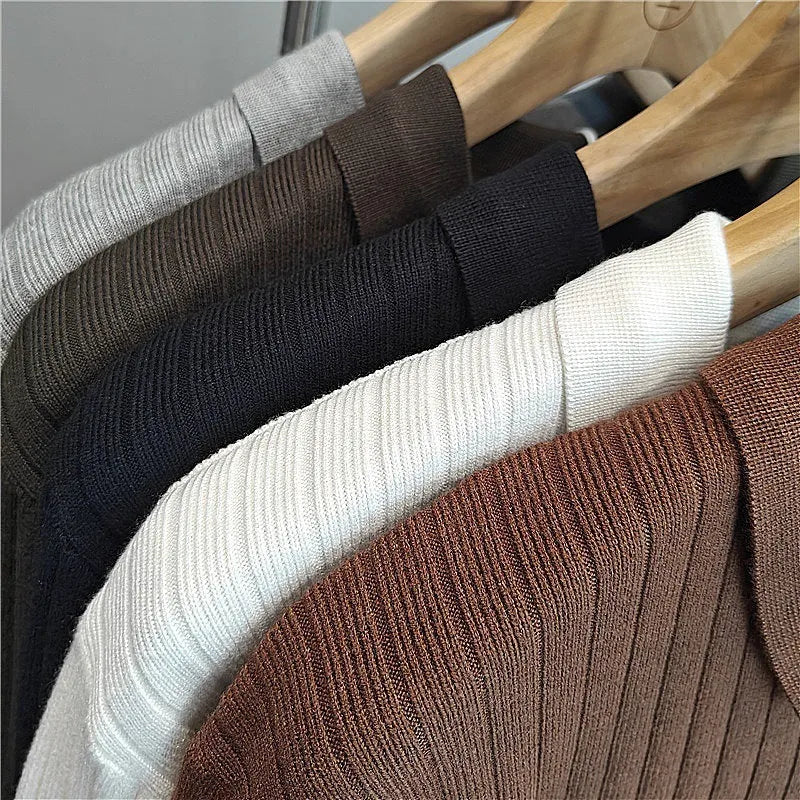 Men's loose fit knitted pullover sweater in modal and rabbit fur fabric, shown in light grey.