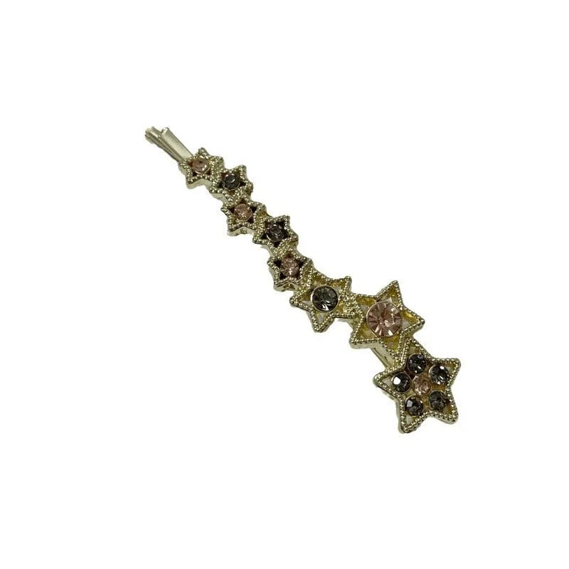 Gold electroplated alloy rhinestone barrette with star charm decoration