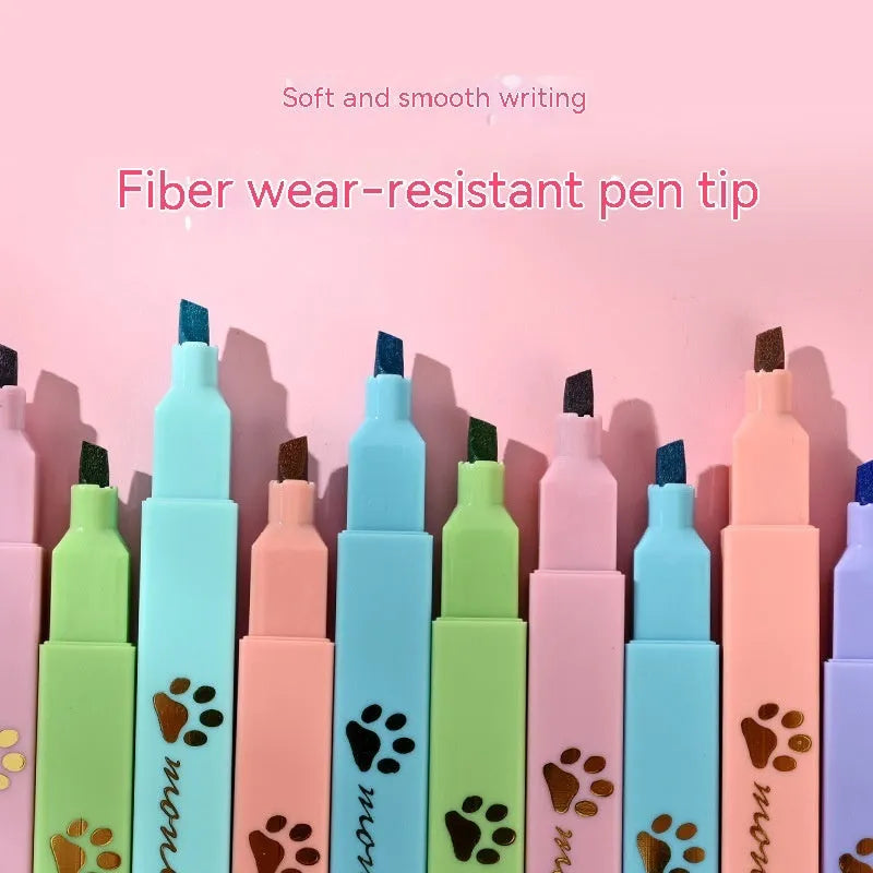 Box of six fluorescent marking pens with plastic shells and oblique nibs in assorted colours.