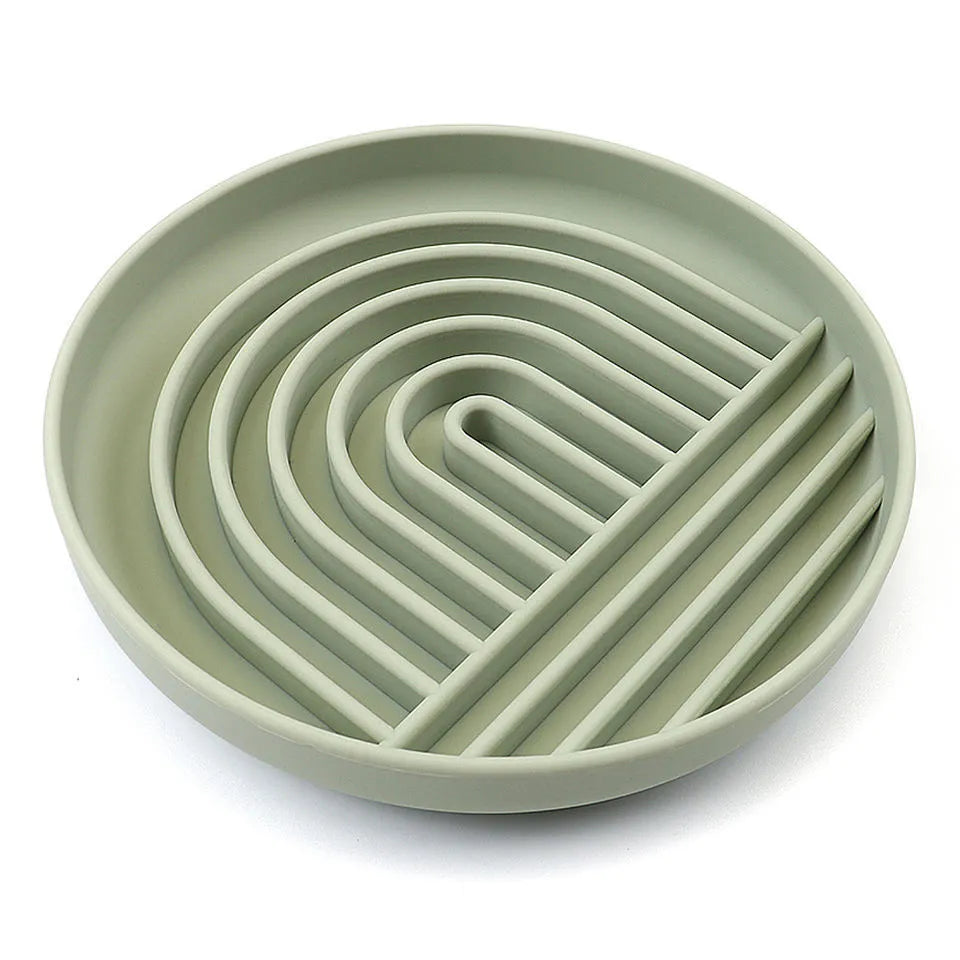 Silicone slow feeder dog bowl with textured ridges, shown in a choice of colours.