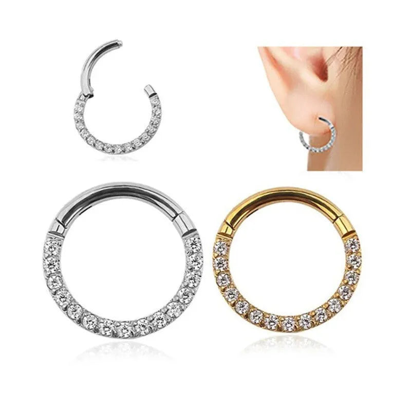 Stainless steel seamless nose ring with diamond accent in gold finish showing circular barbell design