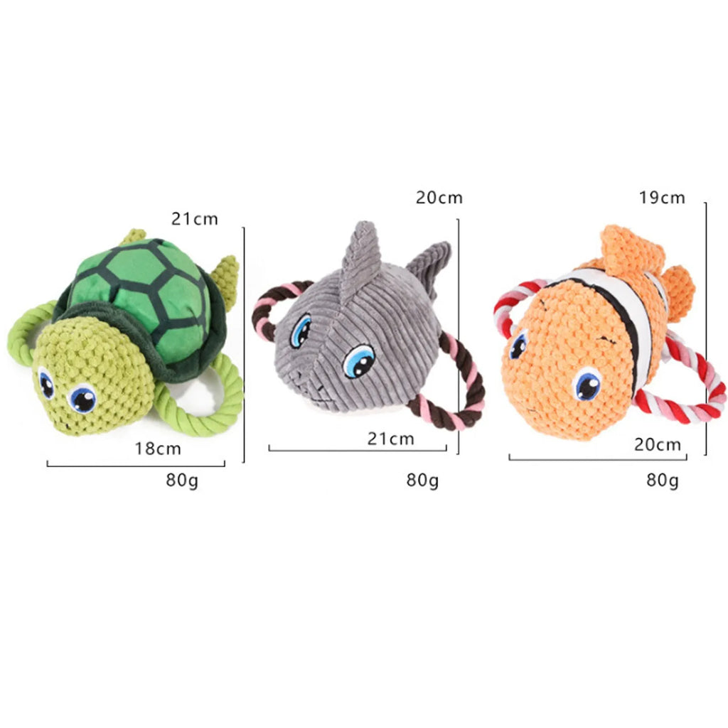 Grey, green, and orange turtle-shaped plush dog toy with a knotted rope chewing core