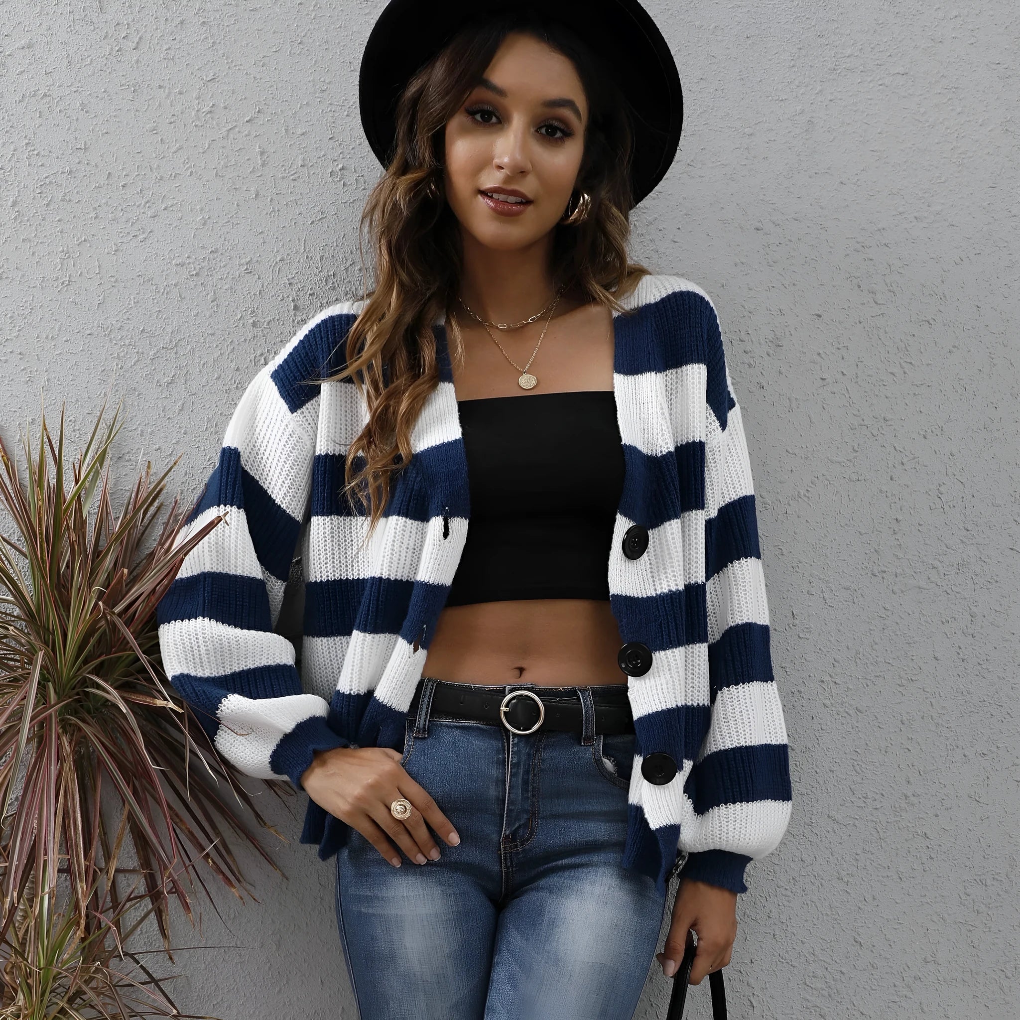 Women's striped button-front cardigan sweater in deer plush fabric, shown in blue.
