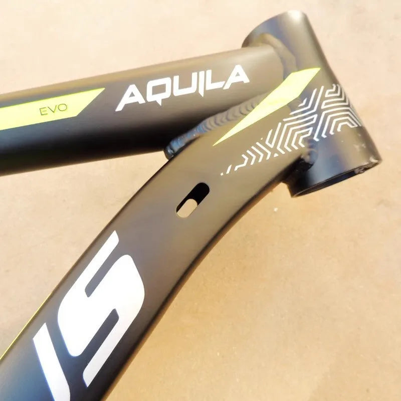 Black green aluminium 29-inch mountain bike frame showing innerline routing and disc brake mounts