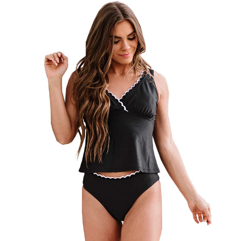 Black solid colour sleeveless one-piece women's swimsuit on a hanger