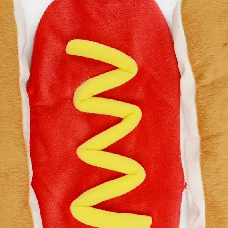 A dog wearing a plush hot dog costume with a back hook and loop closure.