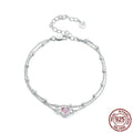 Women's sweet girlish style sterling silver bracelet with a small heart charm on an adjustable chain.