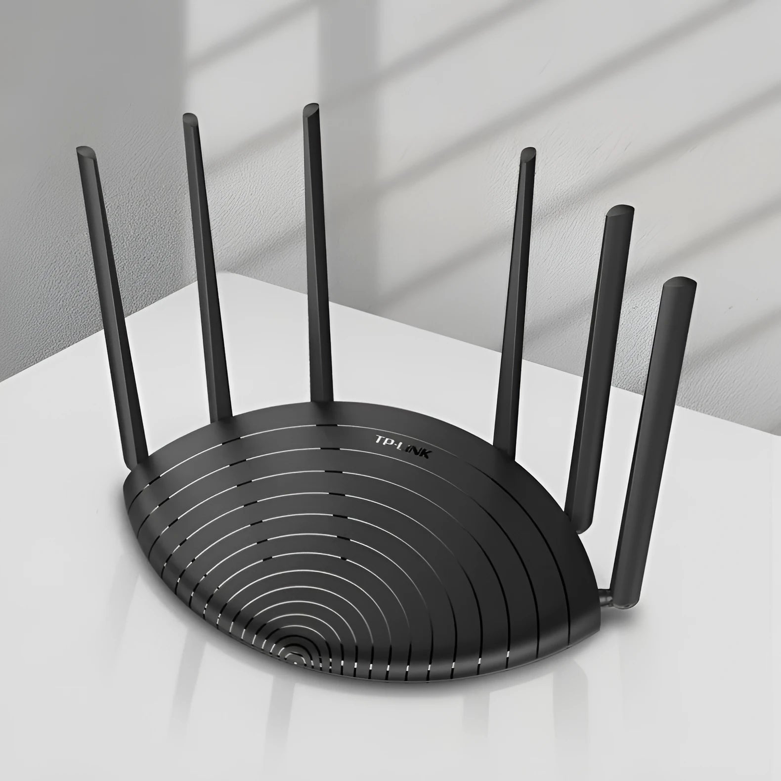 TL-WDR7661 Gigabit Edition AC1900 wireless router unit with network cable.