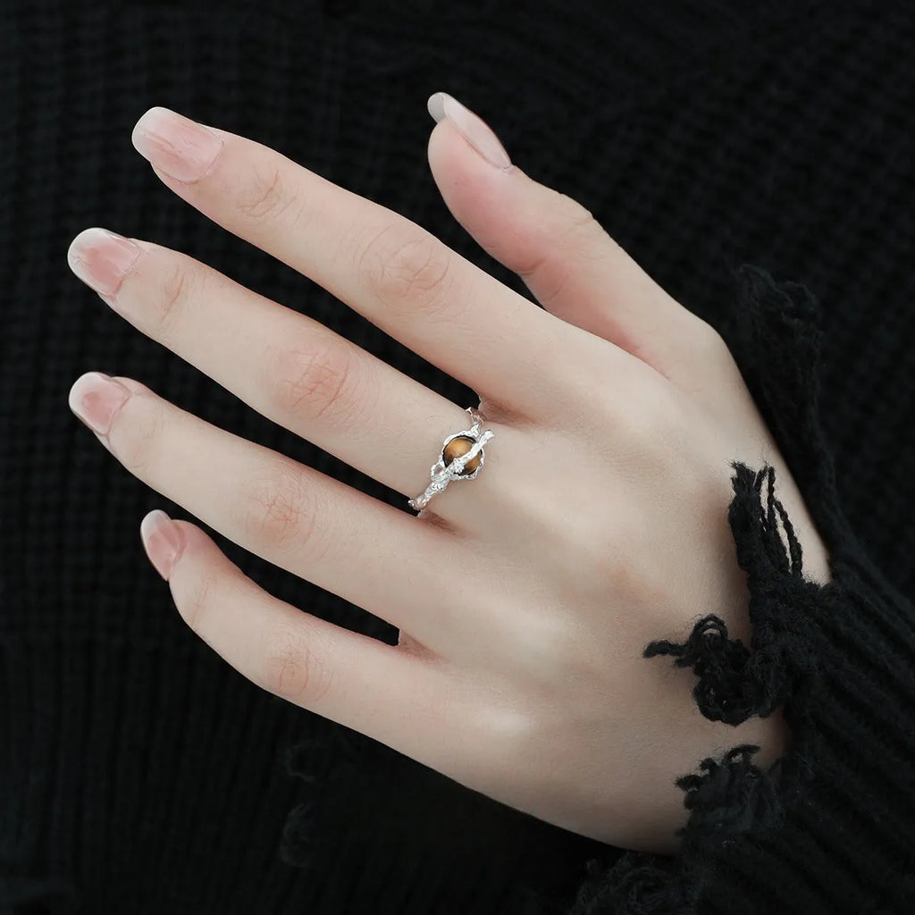 Women's silver Saturn design open ring with adjustable opening in white gold colour