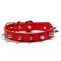 A studded dog collar made of black PU leather with a row of metal spikes and a silver metal buckle.