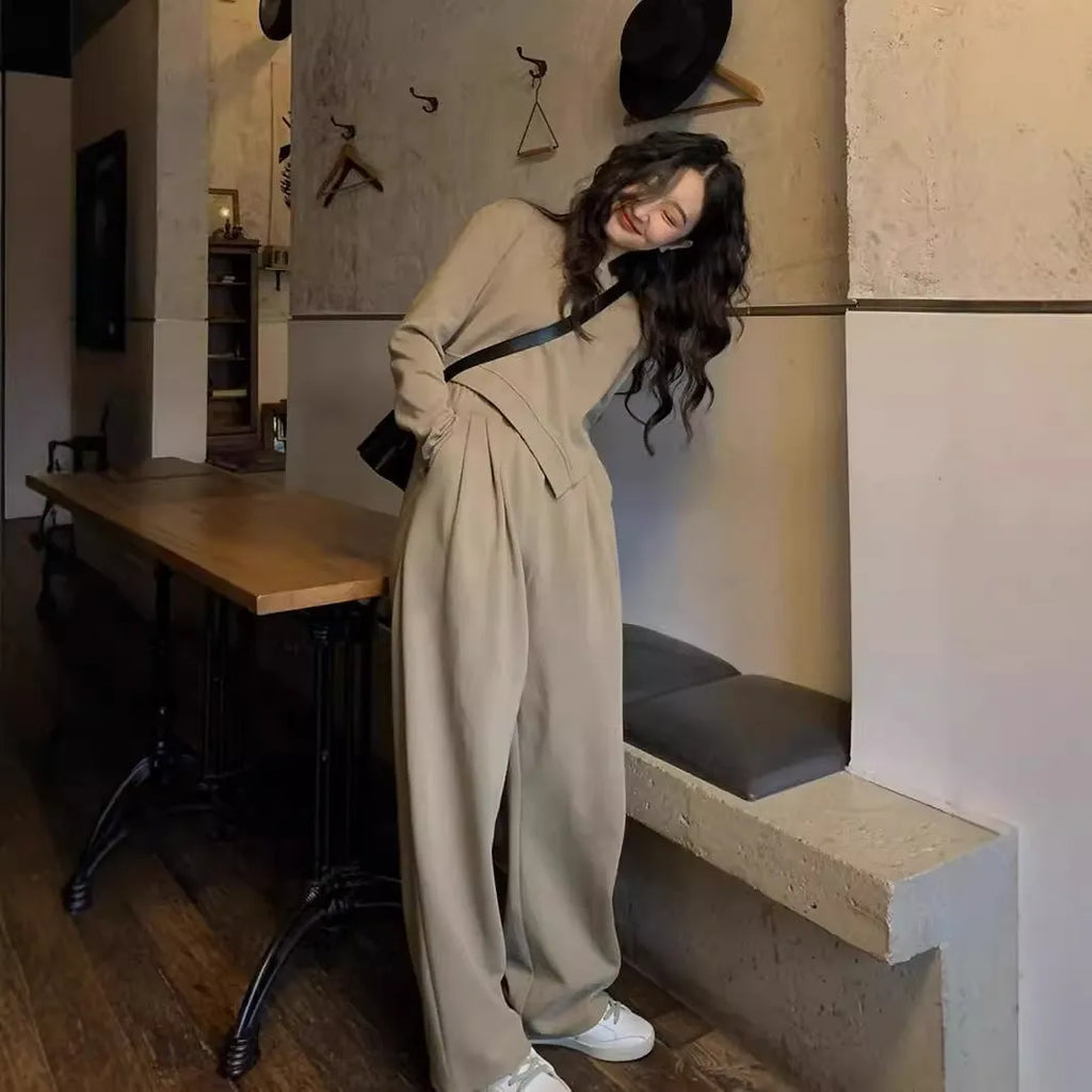 Brown women's loose fit casual sports suit set with long sleeve top and trousers.