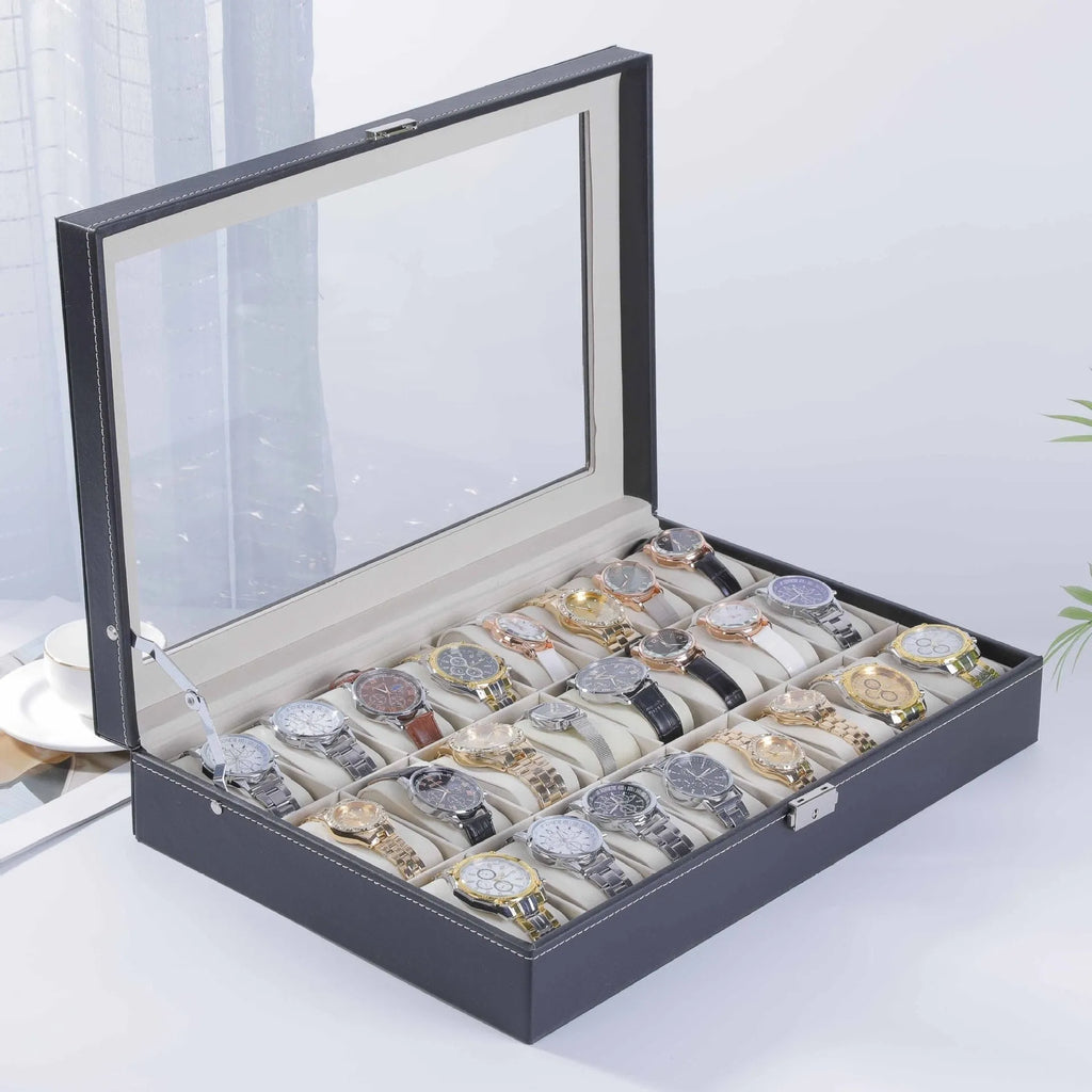 Grey high-grade leather watch storage box with a clear, dustproof lid on a table.