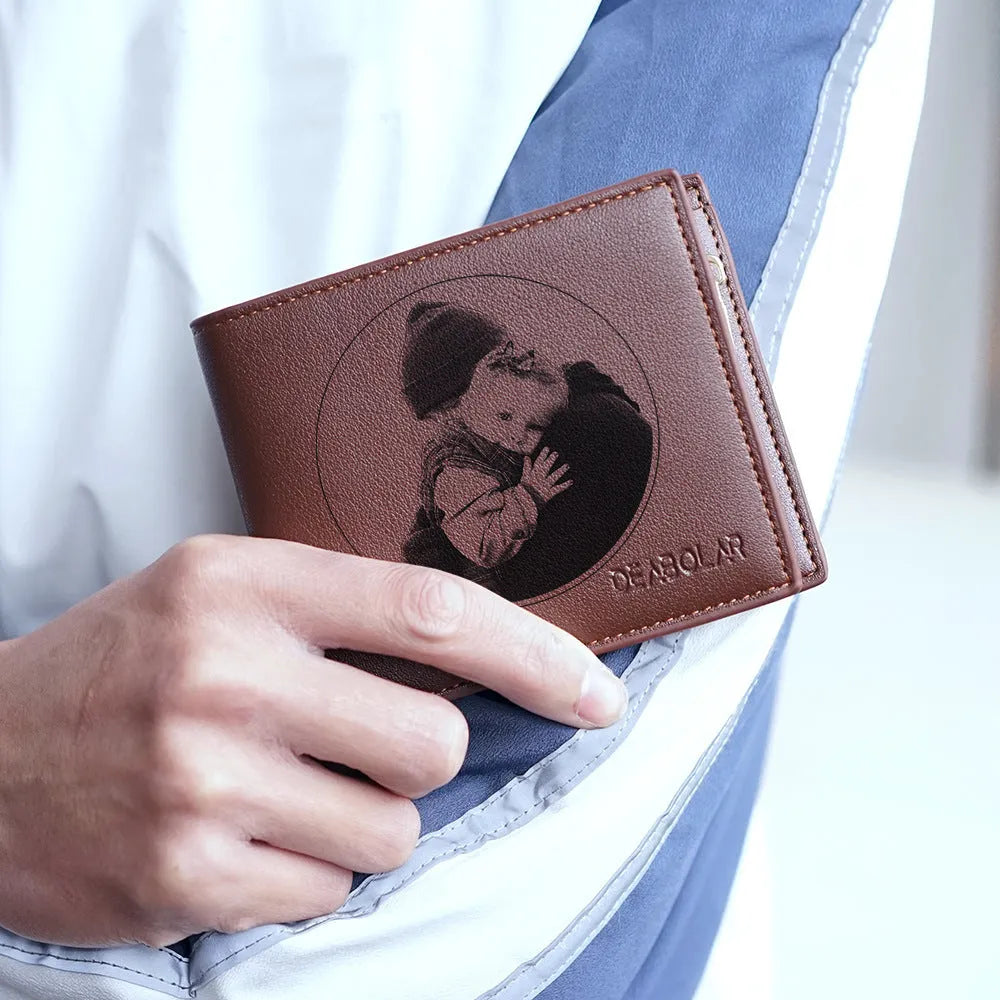 Leather men's wallet with zip closure, shown individually packaged.