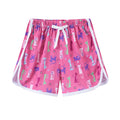 Children's elastic waistband beach shorts in multiple colours and patterns including stripes, florals, and animal prints