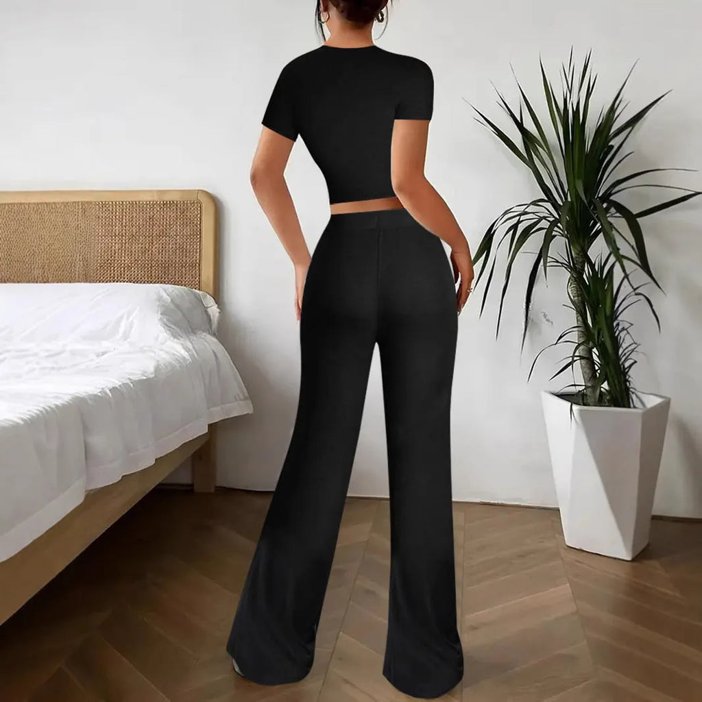 Black women's co-ord set with high waist trousers and a regular sleeve t-shirt
