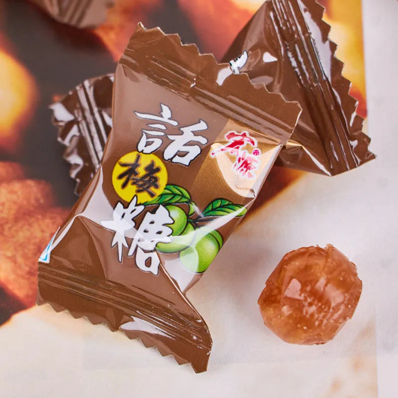 Assorted Chinese fruit flavoured hard candies: guava, plum sugar, and tangerine peel in separate bags.