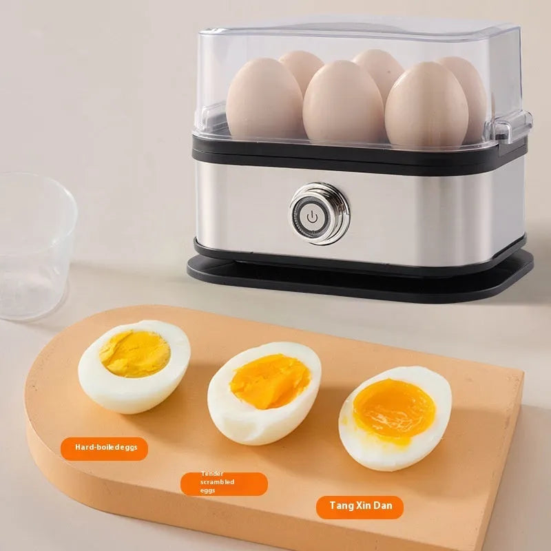 Black portable stainless steel egg boiler with a carrying belt.
