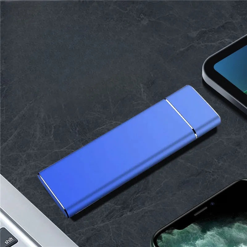 Portable metal external hard disk in Sapphire Blue with USB cable for computer and phone storage expansion