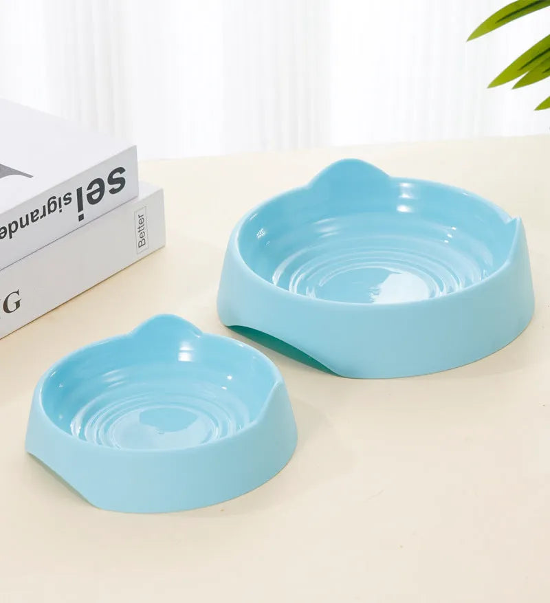 Blue ceramic dog slow feeder bowl with raised internal maze pattern for large breed dogs.