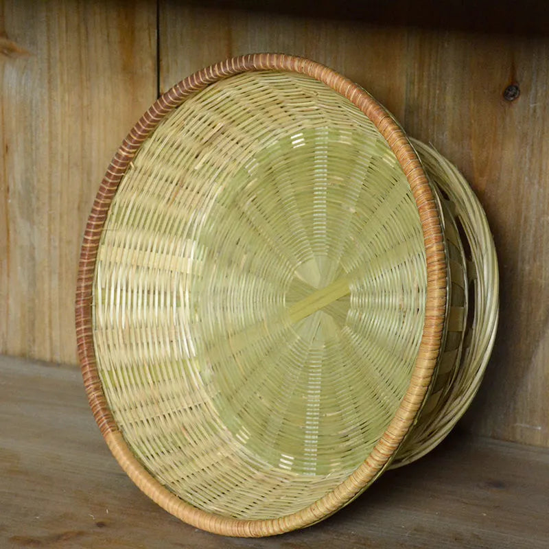 Handmade woven bamboo storage basket in one of three sizes for household organisation.