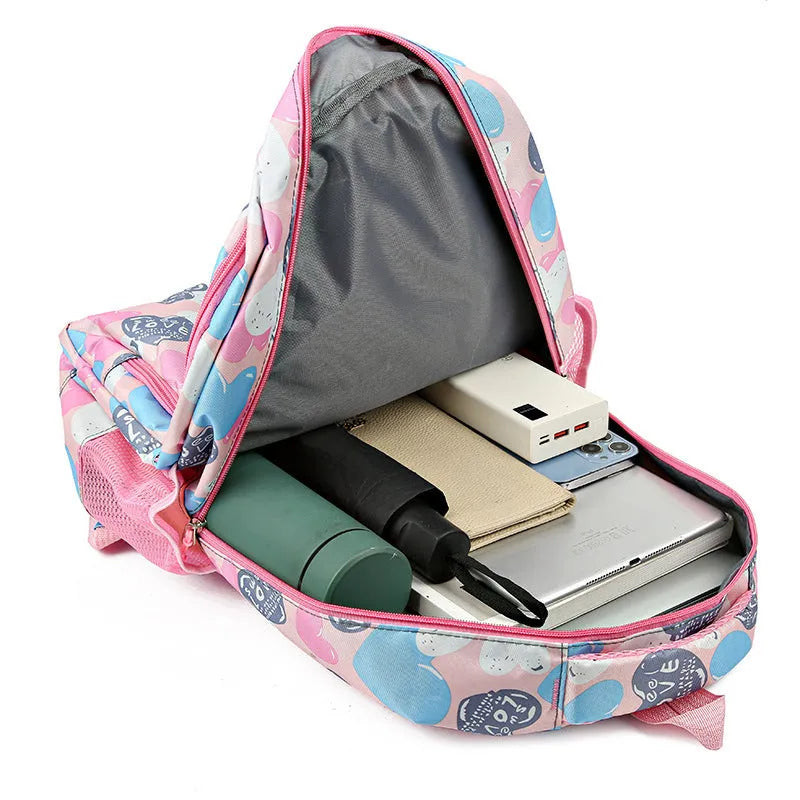 Blue student backpack with air pillow belt system showing large capacity interior