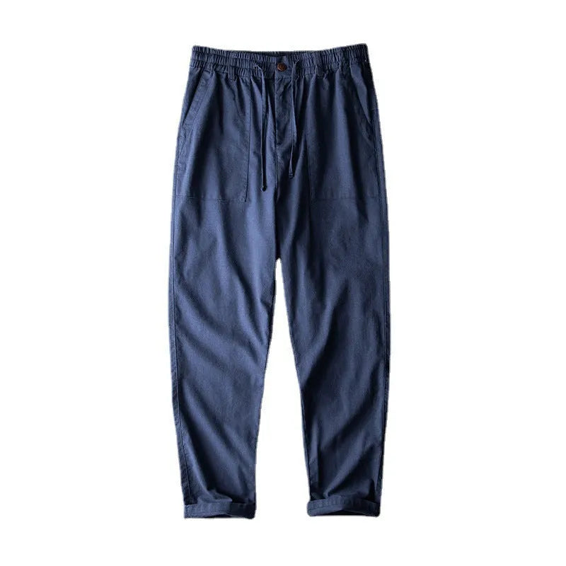 Men's linen trousers in solid colours with mid waist design for casual leisure wear