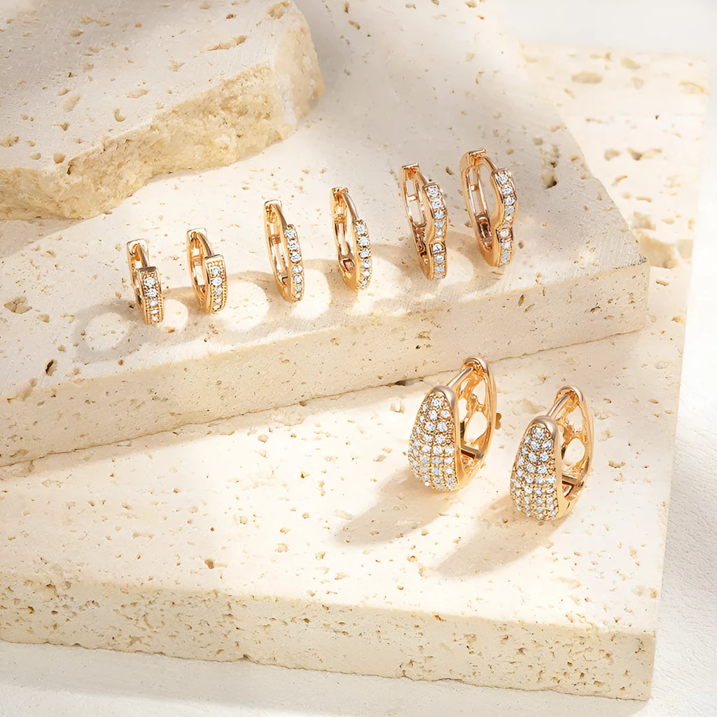 Brass gold plated copper clip earrings with heart shape and zircon gang drill details
