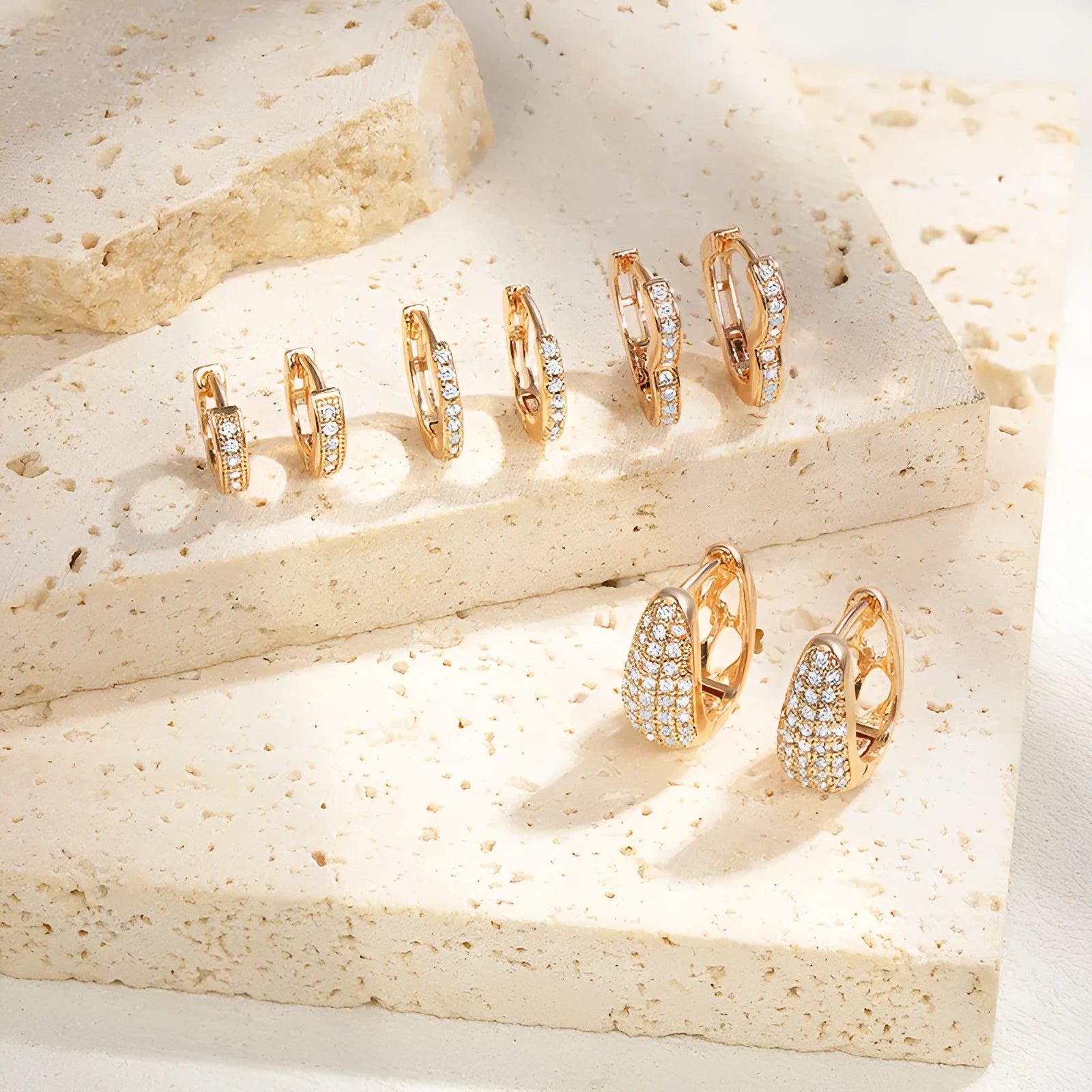 Brass gold plated copper clip earrings with heart shape and zircon gang drill details