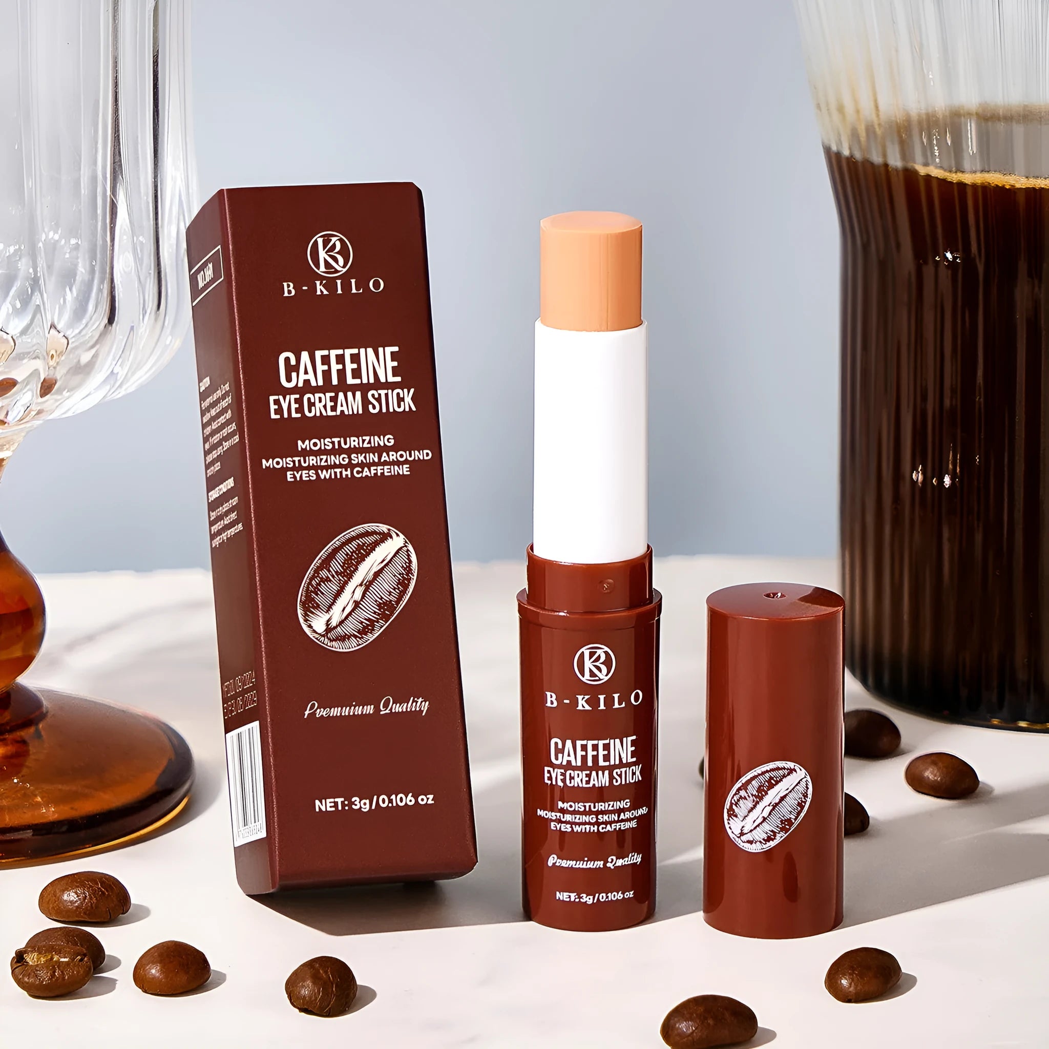 Caffeine eye cream stick in packaging, 3g net content for hydrating and reducing fine lines and dark circles.