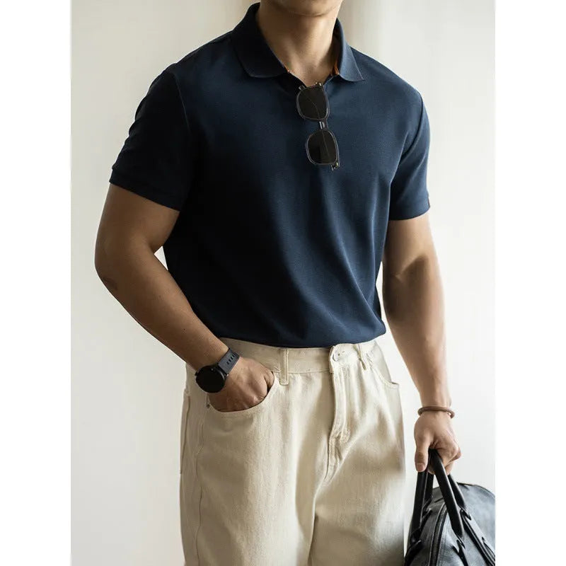 Cotton polyester blend polo shirt in blue colour showing short sleeves and regular cut design