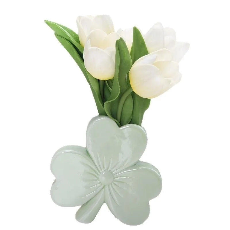A white porcelain ceramic vase in European style for desktop decoration.
