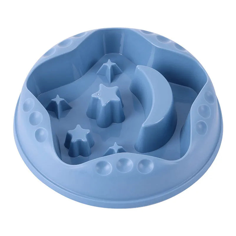 Large blue dog bowl with raised moon and star shapes inside as a slow feeder