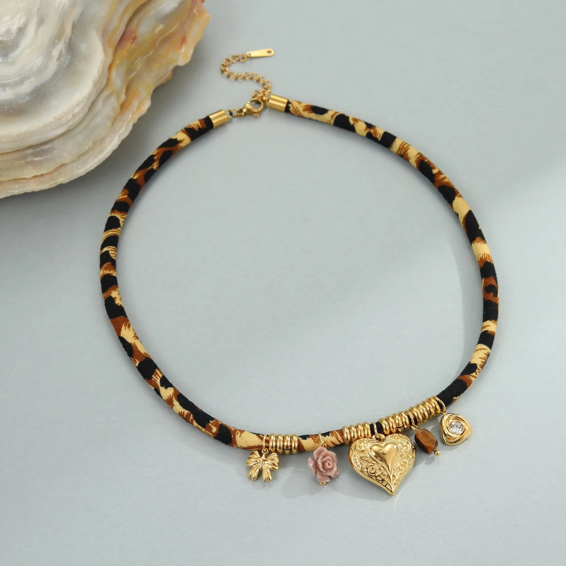 Leopard series stainless steel necklace with 18K gold plated geometric pendant and adjustable chain for women