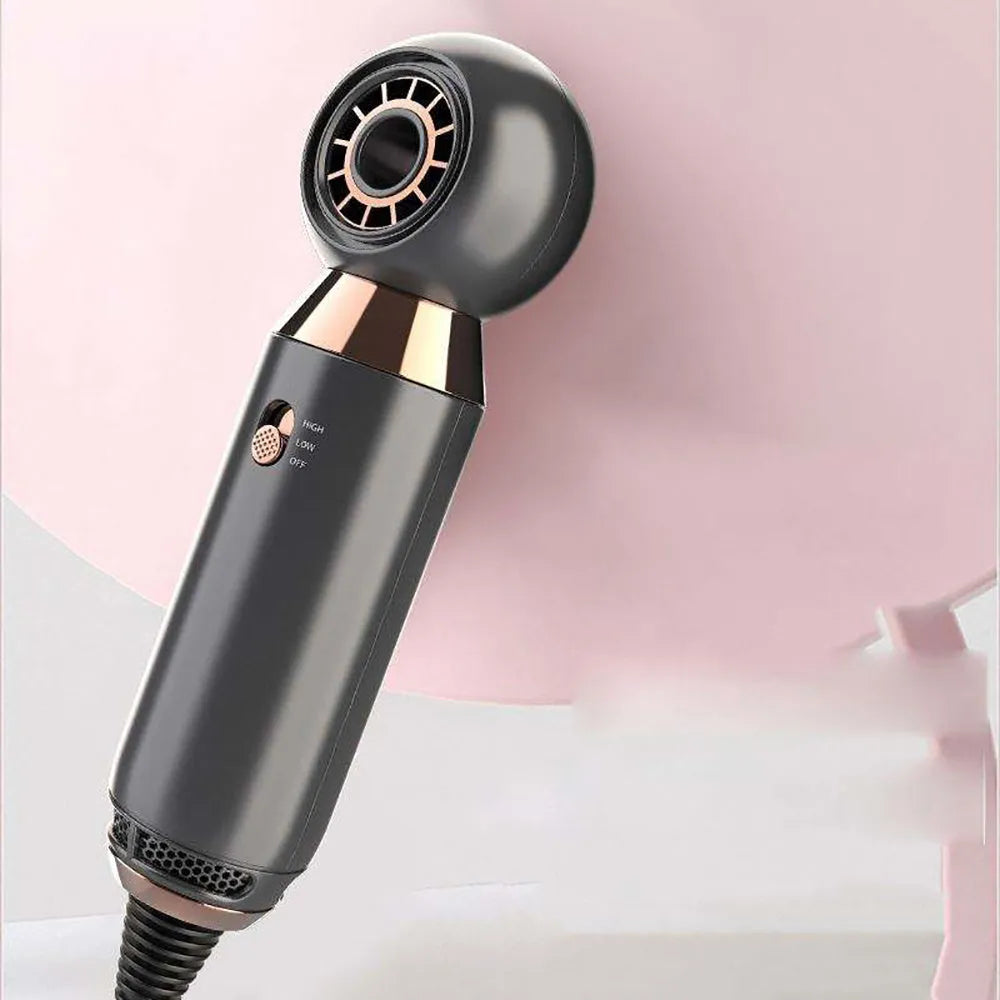 Compact white hair dryer with diffuser attachment on a table