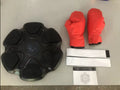 Smart electronic boxing wall target with lights, paired with black and white smart music focus gloves for adults and children.